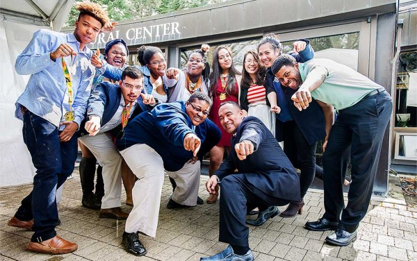 Students and staff pose together outside the ALANA Cultural Center