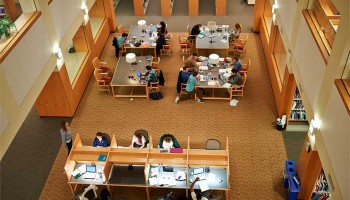 Students studying in the atrium of Case Library