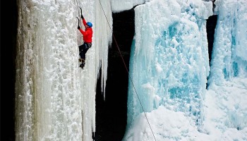 Students ice climbing at Tinker Falls.