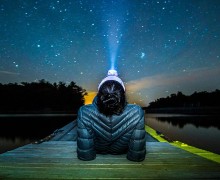Kaitlin Abrams ’18 in the Thousand Islands gazing at the stars while wearing a headlamp