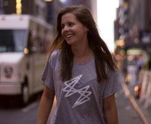 Photo of Katie Sullivan '12 walking down a street in NYC